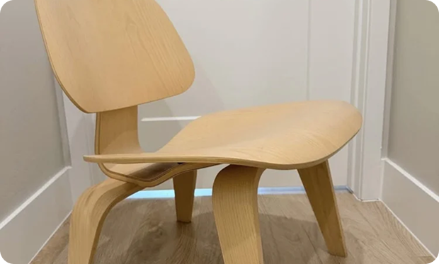 Light wood molded plywood lounge chair